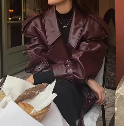 Ladies trendy oversized leather jacket with structured shoulders and waist belt Chic and Style