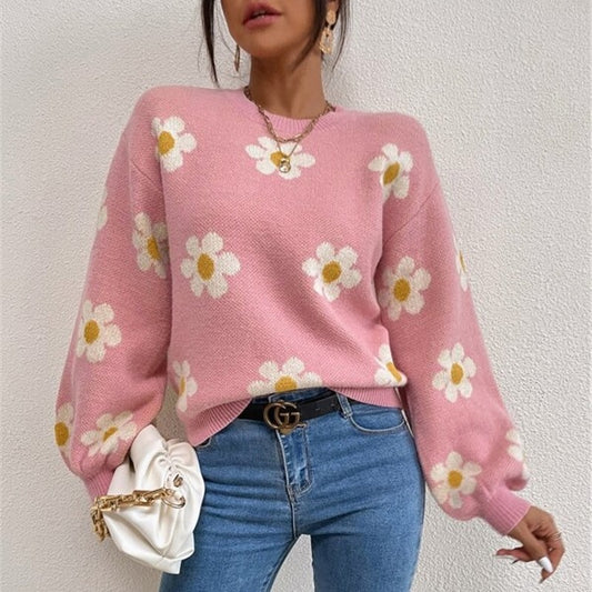 Pull en tricot pour femmes avec un motif floral ludique et des manches bouffantes élégantes Chic und Stil