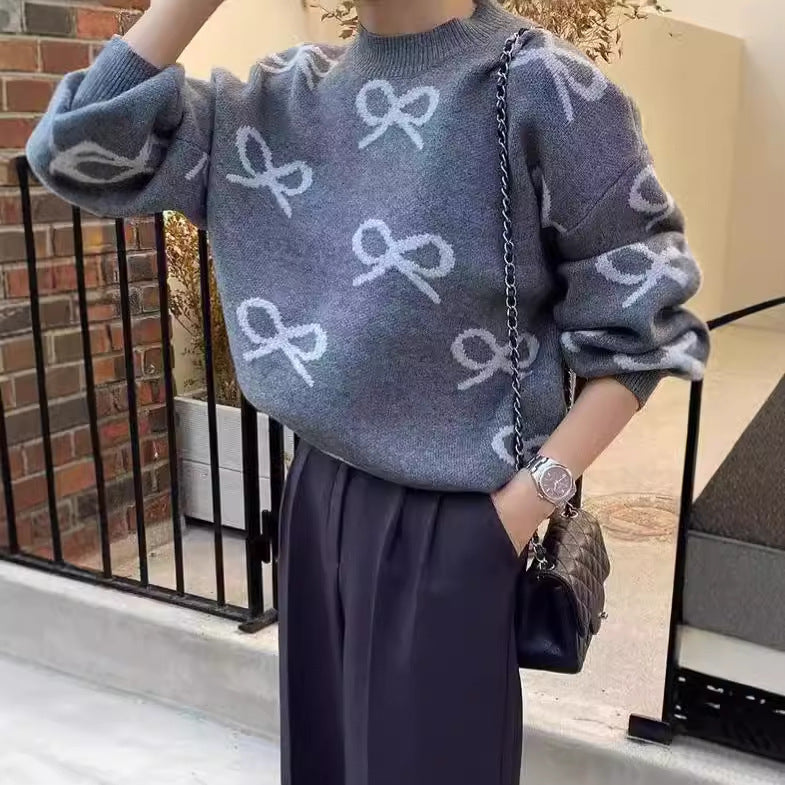Dames Pull doux avec motif romantique en nœud Chic und Stil