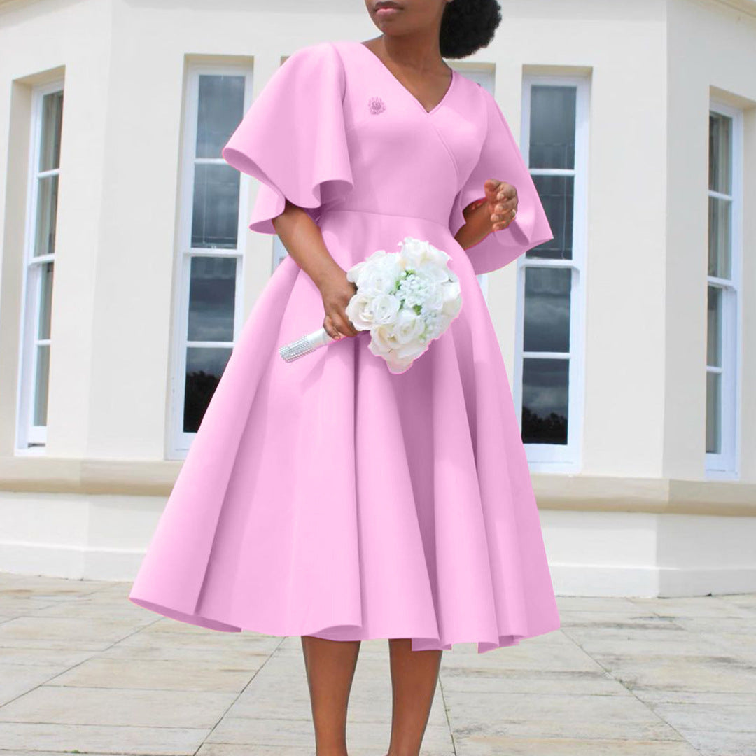 Robe portefeuille pour femmes avec une coupe fluide et des manches volumineuses Chic und Stil