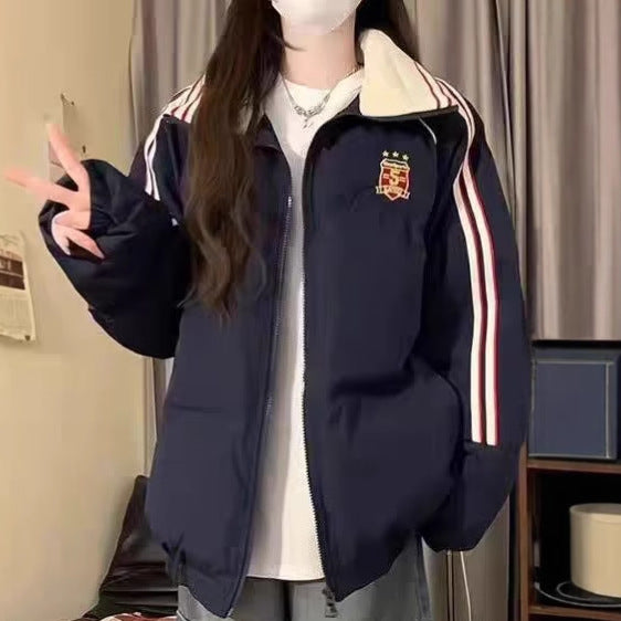 Dame Veste matelassée sportive avec des bandes contrastées et un col haut Chic und Stil