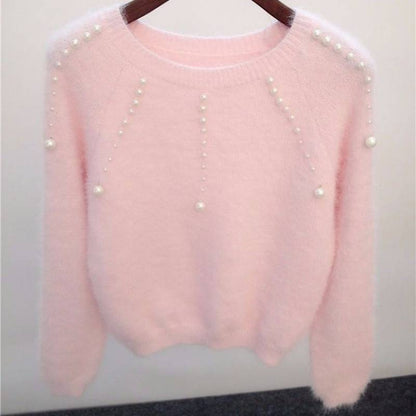 Pull femme élégant avec des accents de perles élégants Chic und Stil