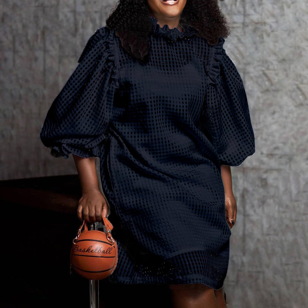 Robe transparente pour femmes avec des manches bouffantes volumineuses et un motif check Chic und Stil