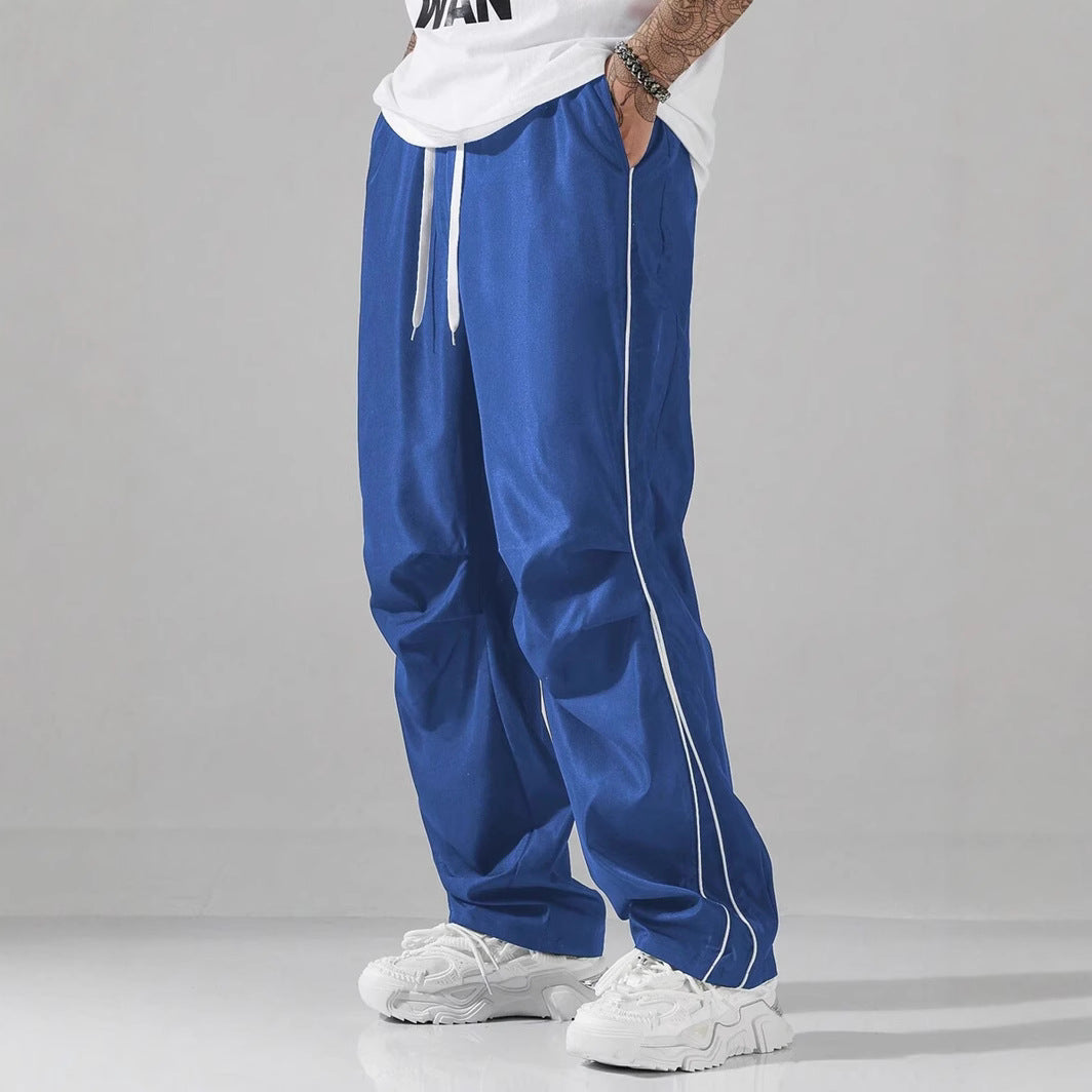 Men's sports pants with elastic waistband and contrasting stripes Chic and Style