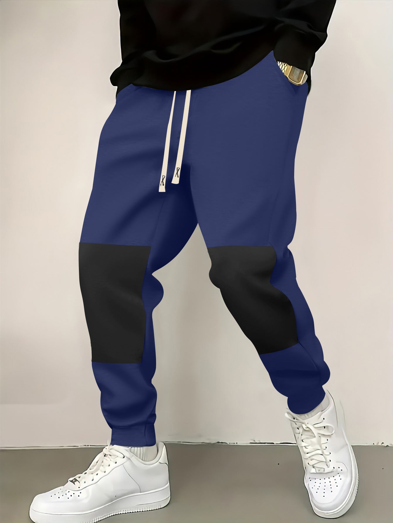 Chic and stylish men's athletic pants with modern color-block elements