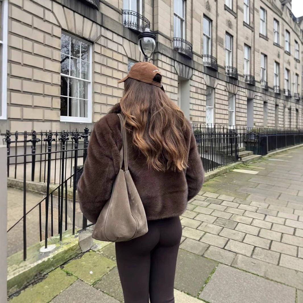 Dames élégante manteau en fausse fourrure avec revers à la mode Chic und Stil