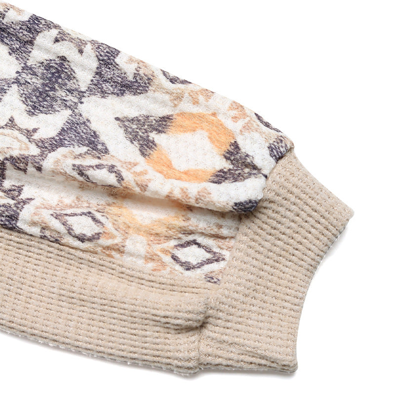 Pull en tricot pour femmes avec des manches raglan modernes et un motif floral Chic und Stil