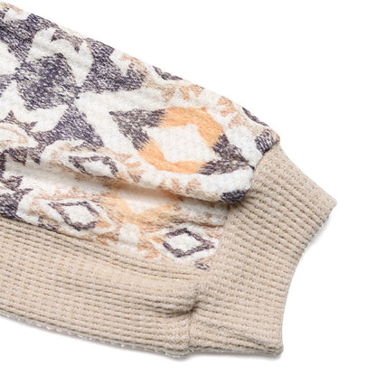 Pull en tricot pour femmes avec des manches raglan modernes et un motif floral Chic und Stil
