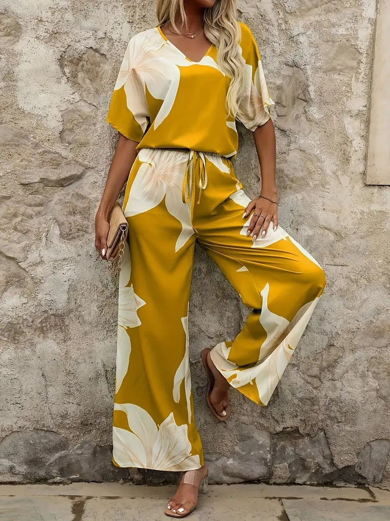 Dames Élégant Jumpsuit avec des motifs floraux et une jambe large Chic und Stil