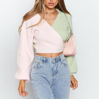 Dames Pull élégant à col en V avec des manches contrastées et une surface texturée Chic und Stil