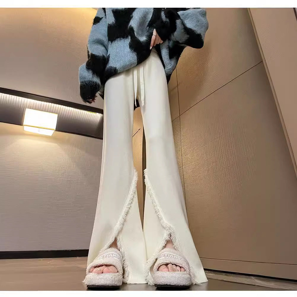 Ladies Elegant Pants with High Side Slits and Chic Fringed Finishes and Style