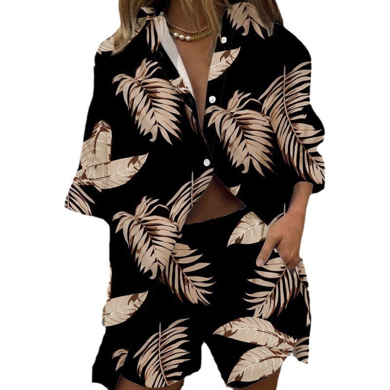 Fashionable two-piece women's set with loose blouse and matching shorts Chic and Style