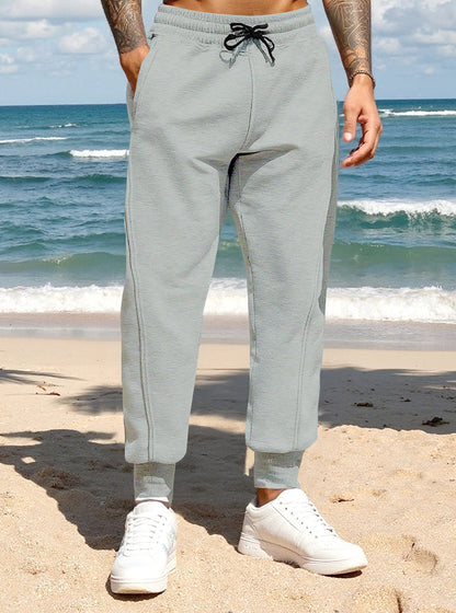 Casual sports pants for men with elastic waistband and practical side pockets Chic and Style
