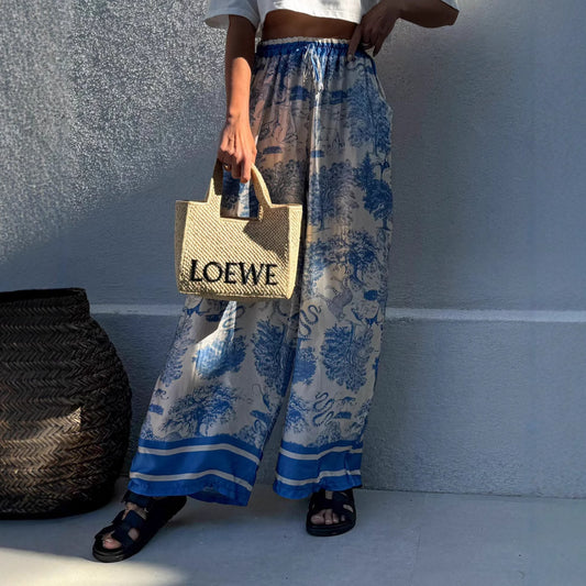 Wide palazzo pants for Damen with floral pattern and elastic waistband Chic and Style