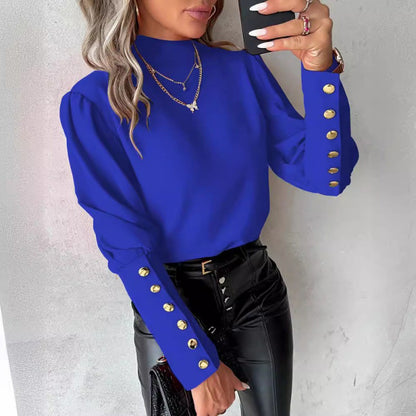 Blouse élégante pour femmes avec des manches bouffantes et des détails de boutons dorés Chic und Stil