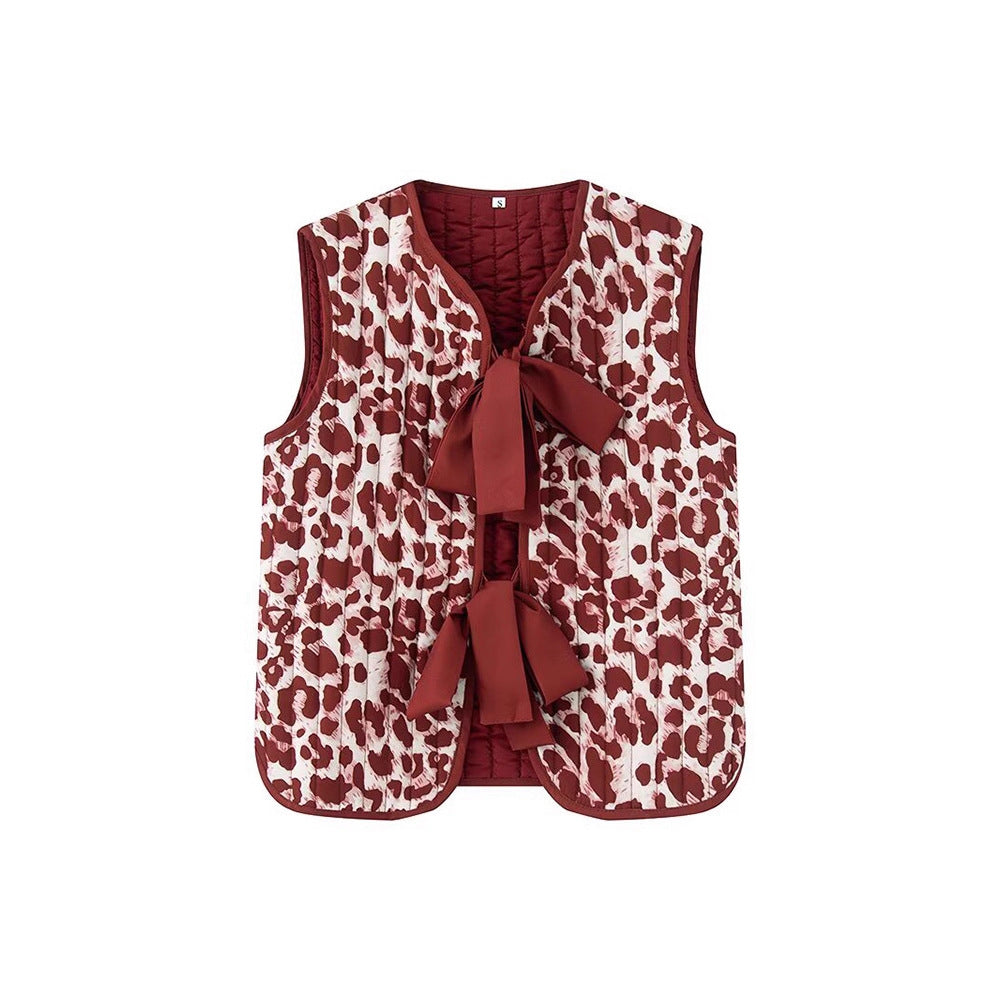 Dames gilet matelassé avec motif animal à la mode et nœud décoratif Chic und Stil