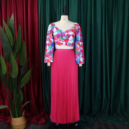 Robe combinée plissée pour dames avec un haut coloré et une jupe évasée Chic und Stil