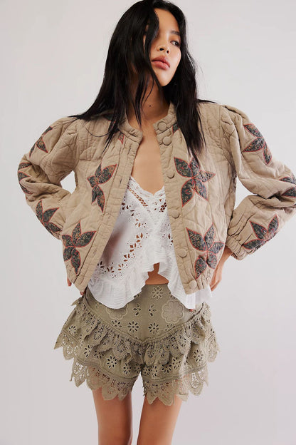 Dames bomber jacket matelassé avec design floral Chic und Stil