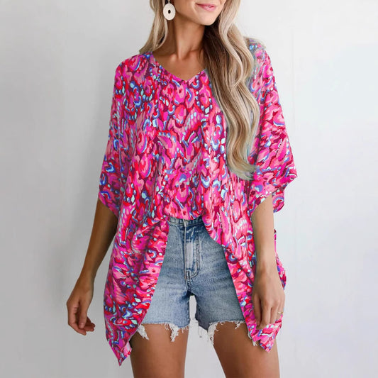 Blouse de plage décontractée pour femmes avec coupe asymétrique et motif coloré Chic und Stil
