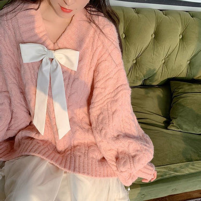 Dames Grand pull en tricot avec détail en noeud et motif en torsades Chic und Stil