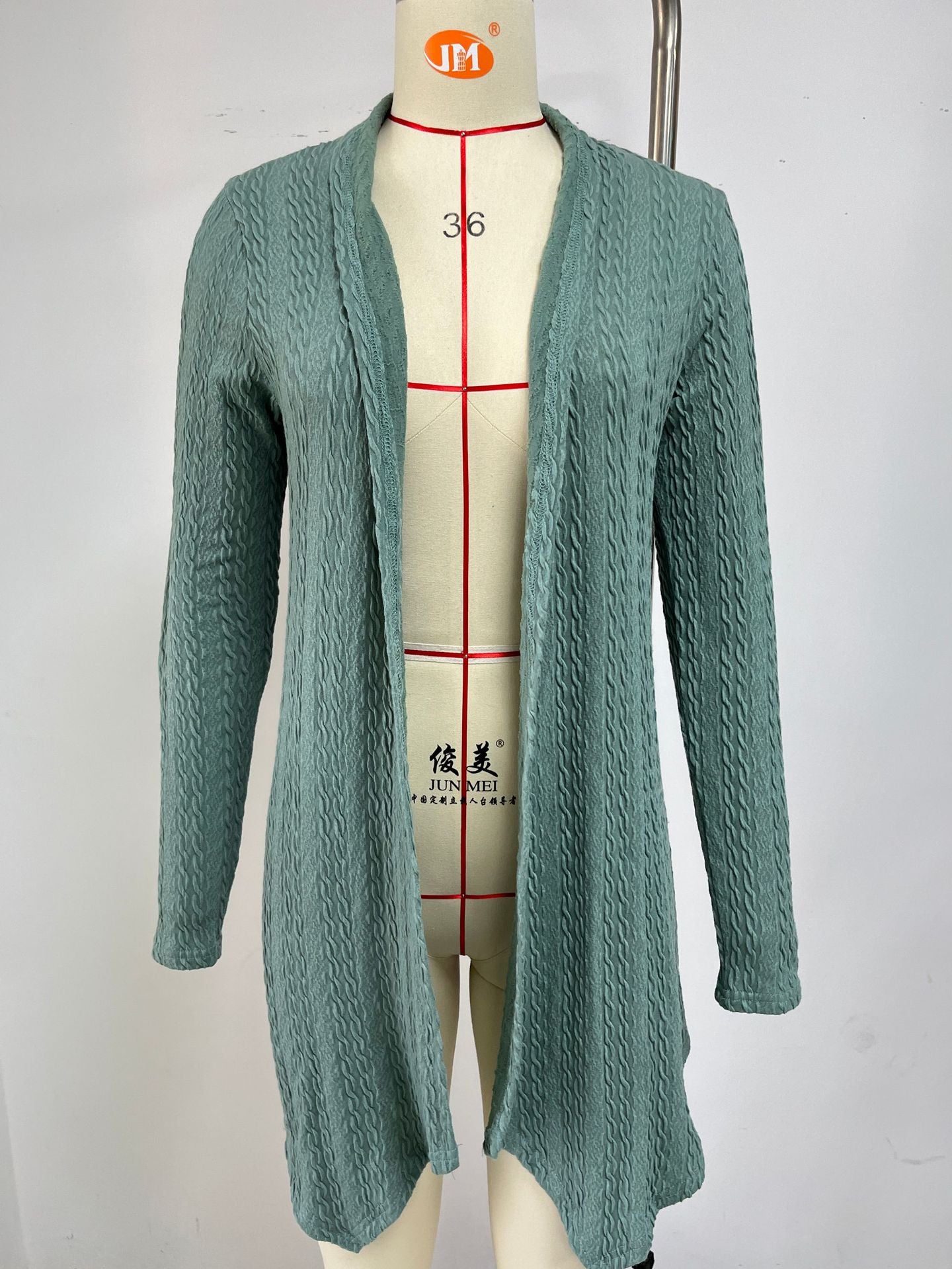 Dame gilet en maille avec motif gaufré structuré et devant ouvert Chic und Stil