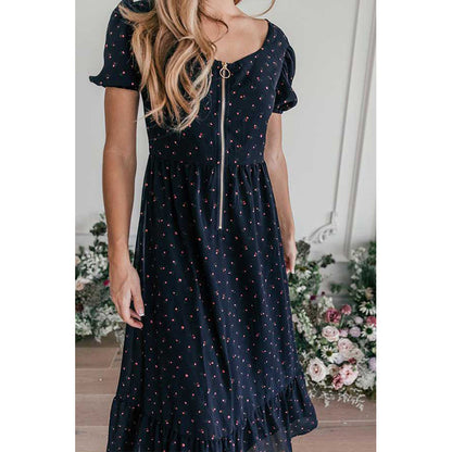 Robe midi florale raffinée pour femmes avec manches bouffantes et détail de fermeture éclair Chic und Stil