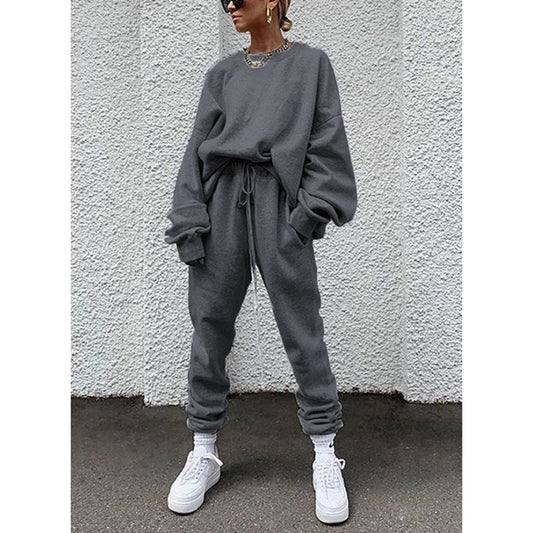 Women casual and comfortable leisure set with an oversized sweater and chic jogging pants and style