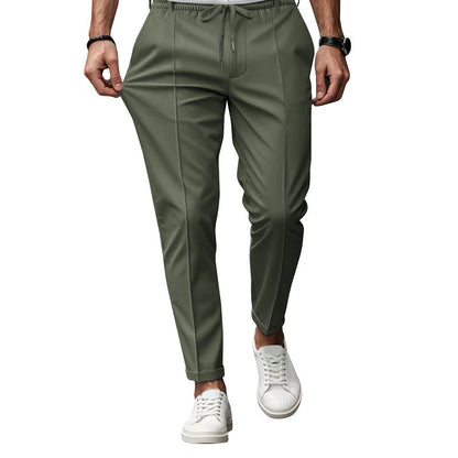 Men's fashionable sports pants with elastic waistband and practical welt pockets Chic and Style