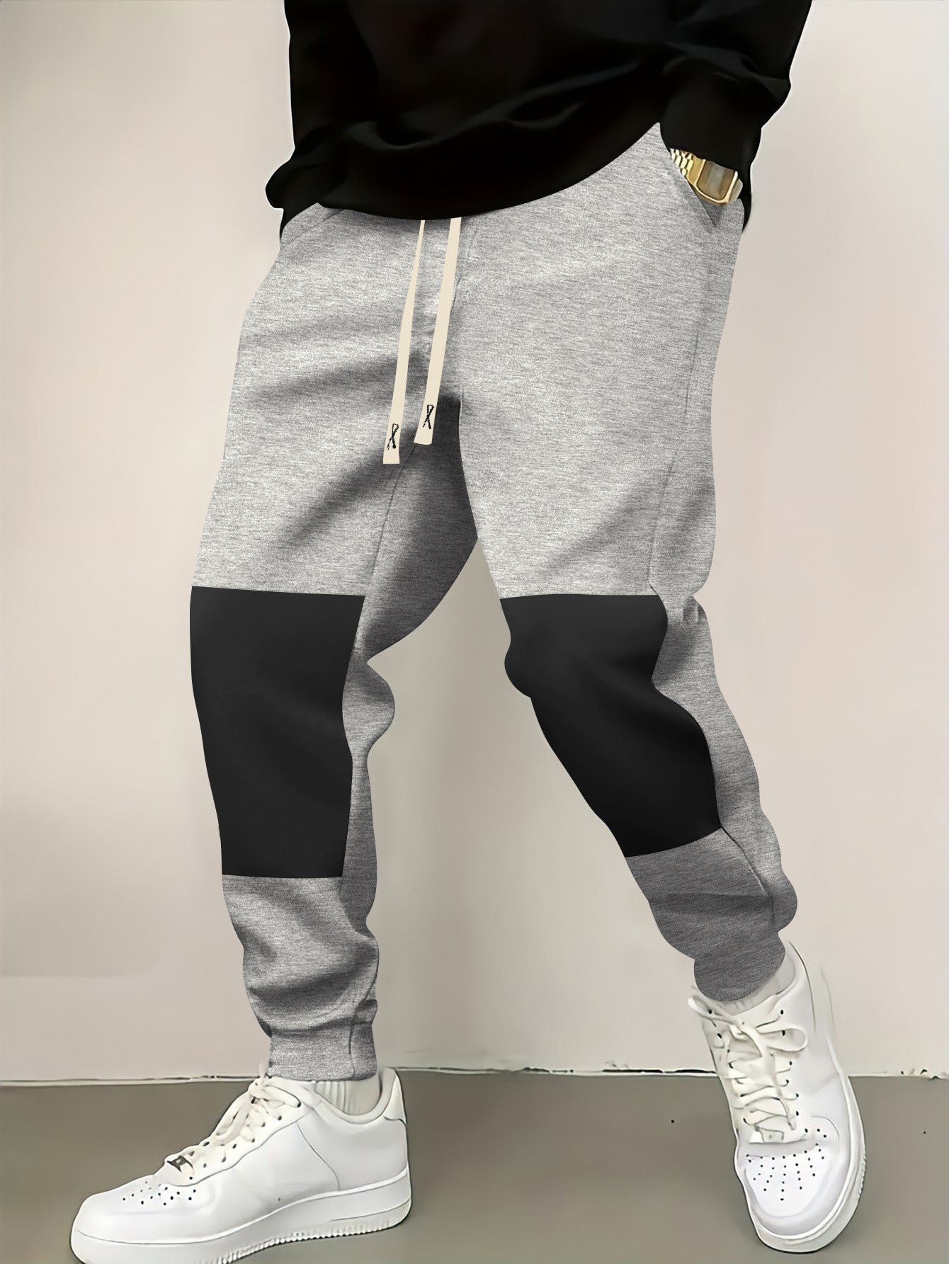Chic and stylish men's athletic pants with modern color-block elements