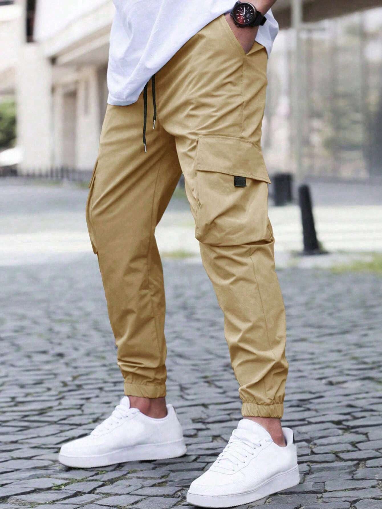 Pantalon cargo pour hommes avec des poches zippées pratiques et une taille élastique Chic und Stil