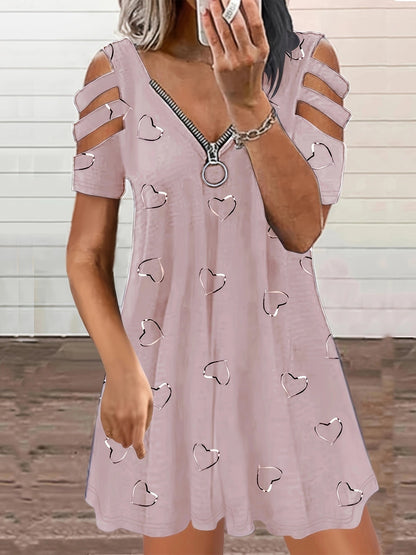 Robe de loisirs pour dames avec des manches à découpe et un motif en forme de cœur Chic und Stil
