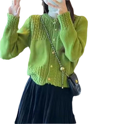 Dames pull-over en maille douillette avec texture en torsades et détails de boutons dorés Chic und Stil