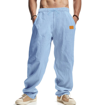 Linen pants for men with a relaxed fit featuring an adjustable drawstring and practical side pockets Chic and Style