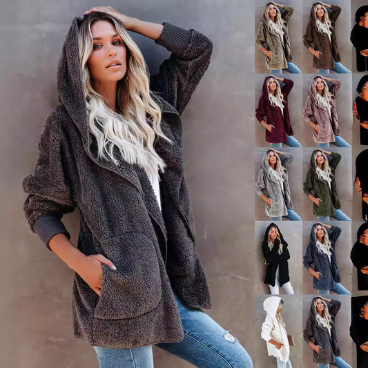 Ladies cozy fleece jacket with wide sleeves and a hood Chic and Style