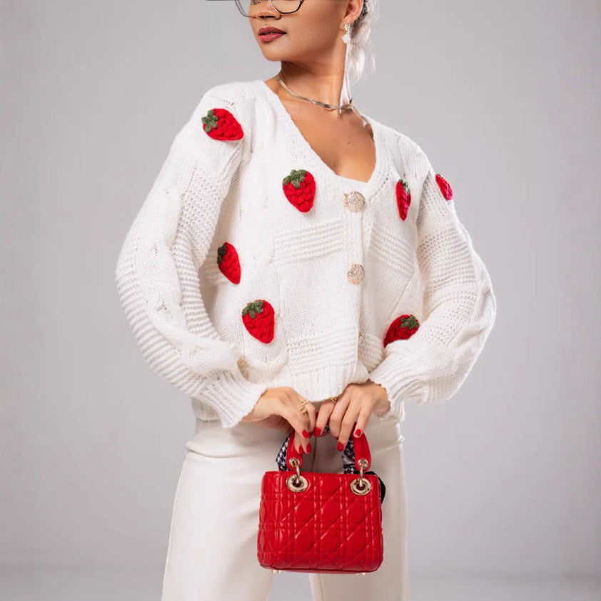 Dames Pull-over fantaisie en tricot avec applications de cerise Chic und Stil