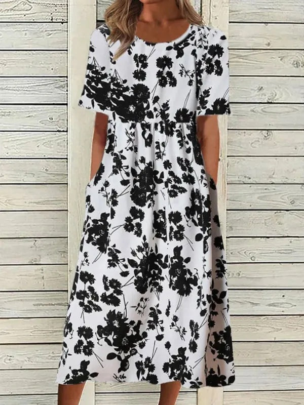 Robe maxi femme avec imprimé floral et poches latérales pratiques Chic und Stil