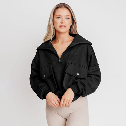 Dames Pull en fleece sportif avec zip et poche Chic und Stil