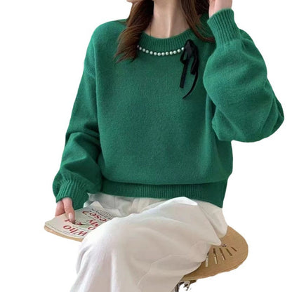 Dames pull mode avec bande décorative et détails en perles Chic und Stil