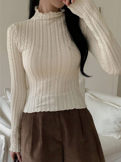 Dames haut à manches longues avec design texturé Chic und Stil