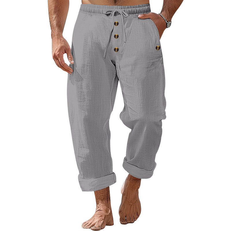 Casual beach pants for men with elastic waistband and practical button details Chic and Style