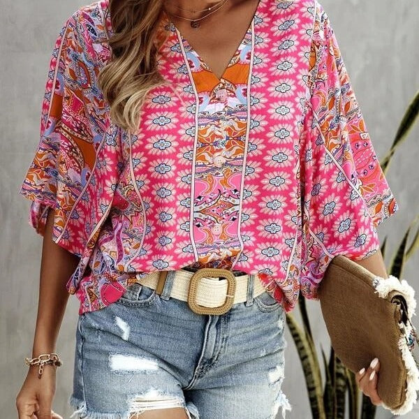 Dames haut léger ample avec motif floral et décolleté en V Chic und Stil