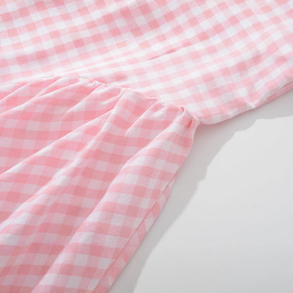 Robe à carreaux pour femmes avec une ceinture de taille ludique et des détails froncés Chic und Stil