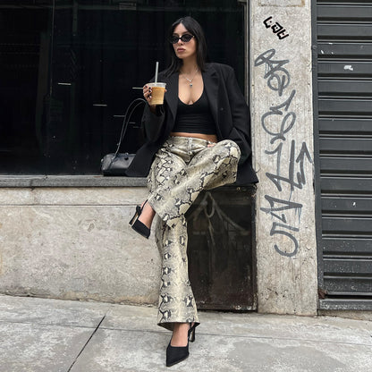 Elegant woman snake print pants Chic and Style