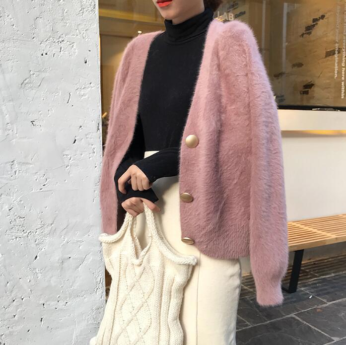 Dames Pull à cardigan douillet avec détails de boutons et design ample Chic und Stil
