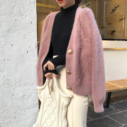 Dames Pull à cardigan douillet avec détails de boutons et design ample Chic und Stil