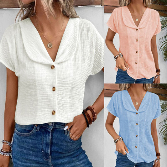 Chemisier féminin avec un col châle élégant et des détails de bouton décoratifs Chic und Stil