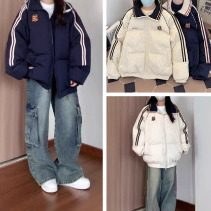 Dame Veste matelassée sportive avec des bandes contrastées et un col haut Chic und Stil