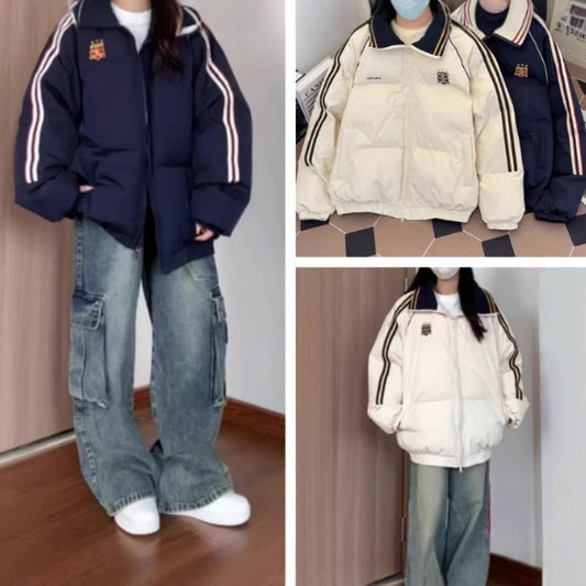 Dame Veste matelassée sportive avec des bandes contrastées et un col haut Chic und Stil