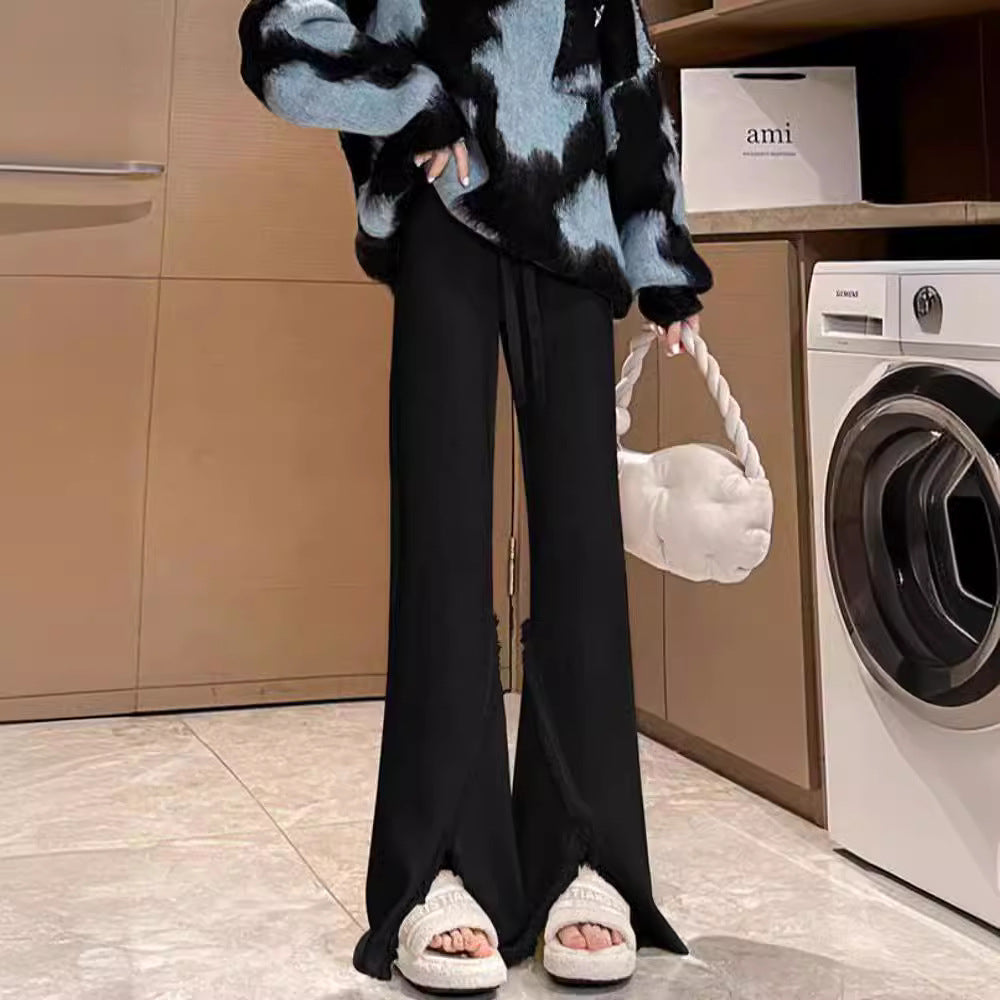Ladies Elegant Pants with High Side Slits and Chic Fringed Finishes and Style