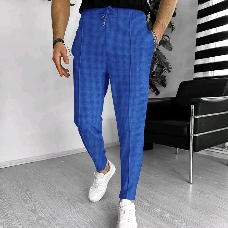 Casual men's leisure pants with elastic waist and stylish structural design Chic and Style